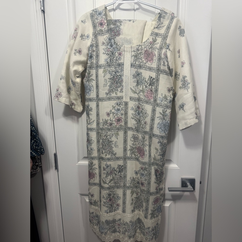 Floral Print Cream Indian suit  fits size XS to large material inside the shirt